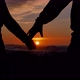 Slow Motion Couple Joining Hands Together with Sunlight in Background - VideoHive Item for Sale