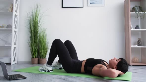 Home Fitness Sportive Woman Abs Training Strong