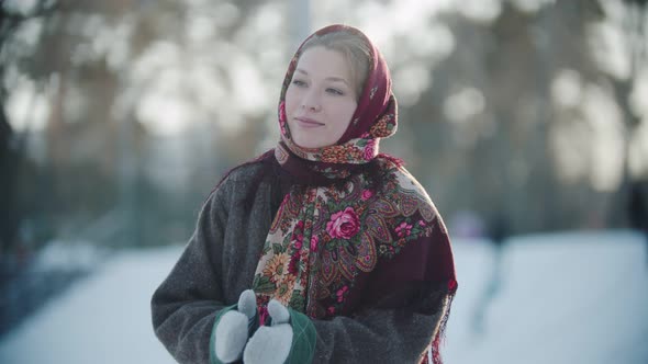Russian Folklore - Beautiful Russian Woman in a Scarf Is Clapping Her Hands and Smiling