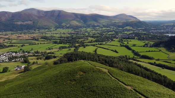 Looking towards Skiddaw and Belcathra from Barrow in the Lake District. Aerial footage from a drone.