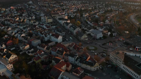 Drone Flying Over Small Spa Town in Evening Light