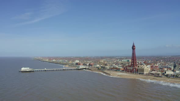 Stunning aerial view, footage of Blackpool Tower  from the sea of the award winning Blackpool beach,