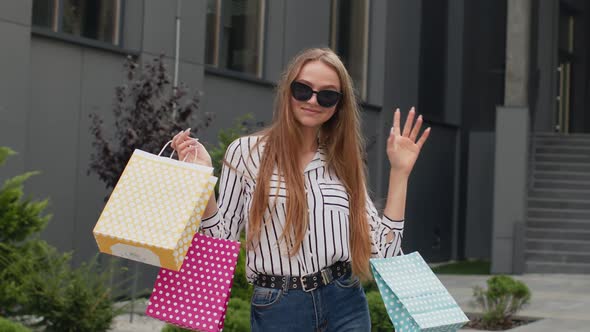 Student Teen Girl with Shopping Bags. Good Black Friday Holiday Sale Discounts, Low Price Purchases