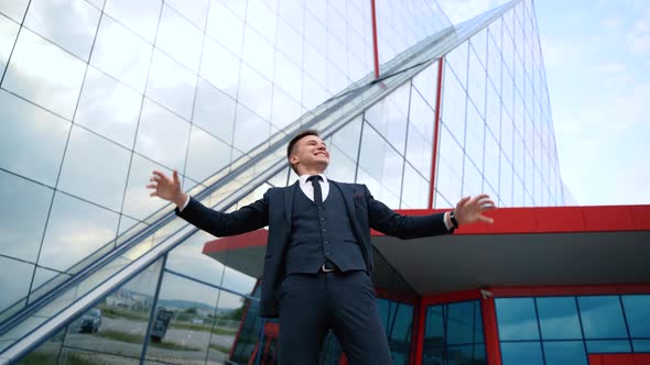 Handsome Businessman Full of Happiness Enjoying Great News About His Business Deal Outdoor