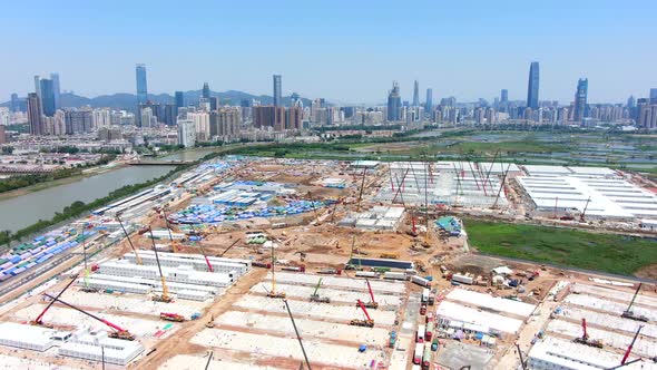 Massive construction site with cranes and development in Hong Kong