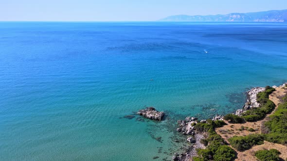 Coastline, zooming in on the different landforms such as the promontory, bay, and cove