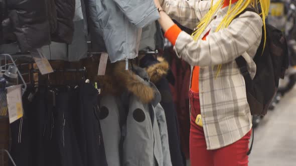 Woman Shopping in Sportive Wear Store