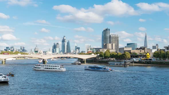 View along the River Thames over Waterloo Bridge to the City of London