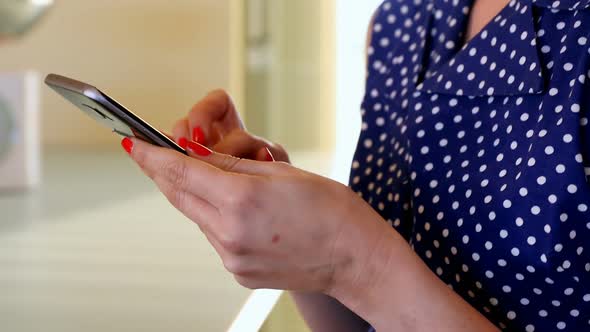 Woman using mobile phone 4k