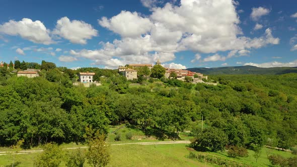 Vertical axis video of the historical worlds smallest city Hum in Croatia during daytime 