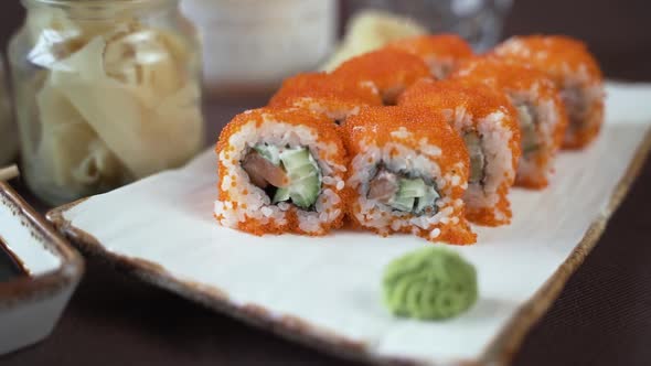 Sushi with cucumber, salmon and red caviar