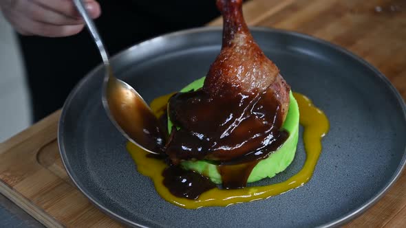 Chef Prepares Duck Legs