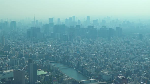 Zoom out, Aerial view of Tokyo with skylines from Skytree tower.