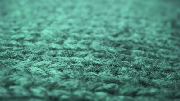 Extreme Detail View of Sheep Wool Cloth Texture Flowing in Macro Dolly Shot