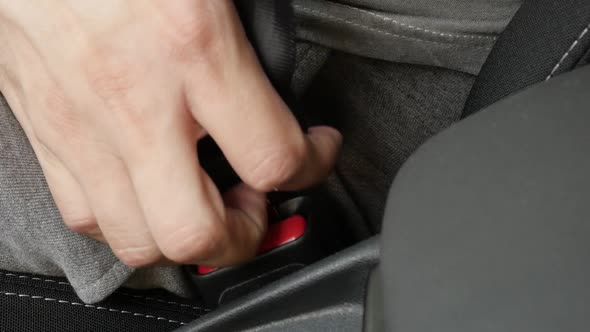 Slow motion connection of passenger 3-point seat  belt on buckle