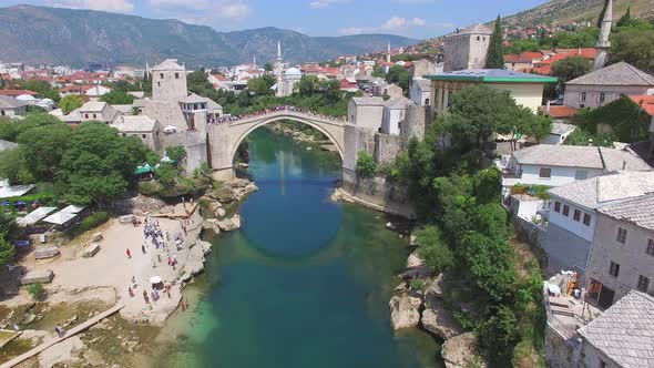 Crowd watching people jumping of the bridge in Mostar