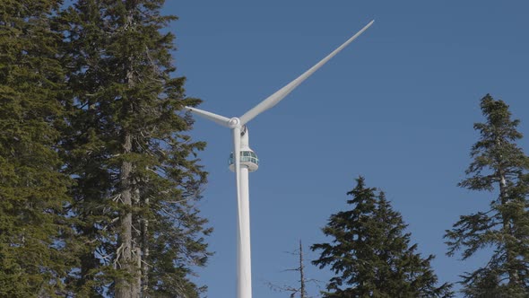 Wind Turbine on Top of Grouse Mountain During Sunny Winter Season