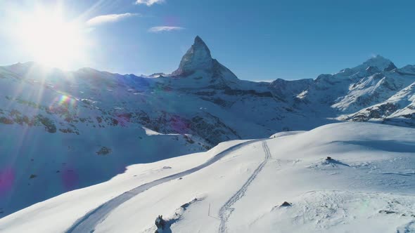 Blue Matterhorn Mountain in Sunny Winter Day. Swiss Alps. Switzerland. Aerial View