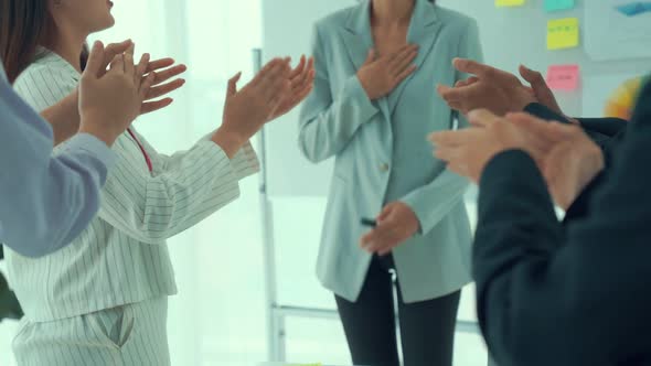 Business People Proficiently Discuss Work Project on Meeting Table