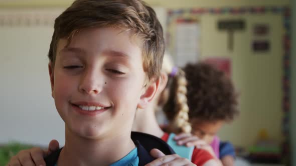 Boy smiling in the class