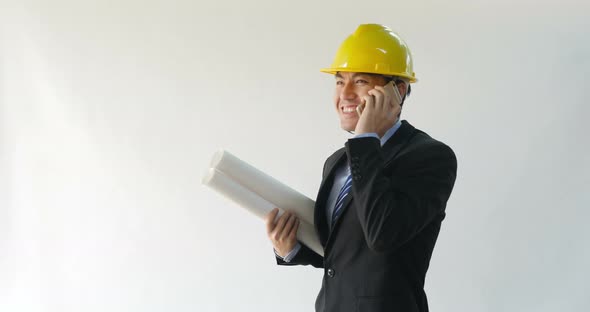 Male Architect Talking On Phone