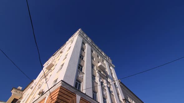 Elegant Classic Style Building with Balcony and White Decor