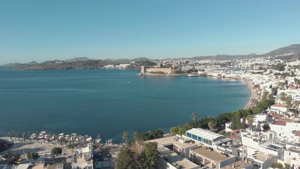 Seaside marina of Bodrum with castle of St. Peter in sight in Aegean Region of Turkey