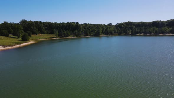 Aircraft jet style turn over water with mavic drone.