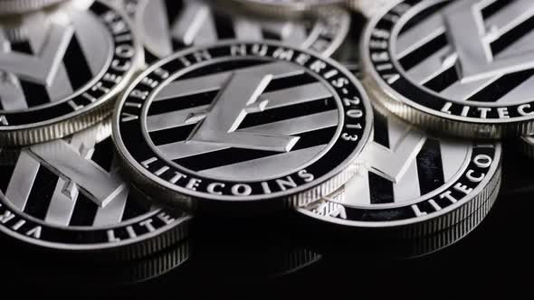 Rotating shot of Bitcoins (digital cryptocurrency) - BITCOIN LITECOIN 428