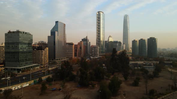 Aerial establishing shot of Sanhattan district from Bicentenario park looking to the towers
