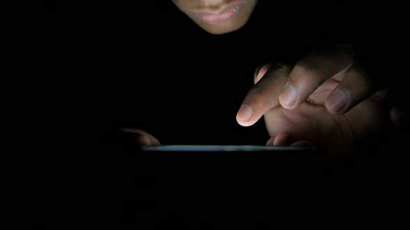 Close Up of Man's Hand Using Smart Phone at Night 