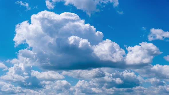 Timelapse of Cumulus Clouds Moving in the Blue Sky Cloud Space