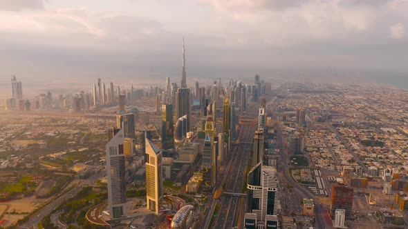 Aerial view of Burj Khalifa in Dubai Downtown skyline and highway, United Arab Emirates or UAE