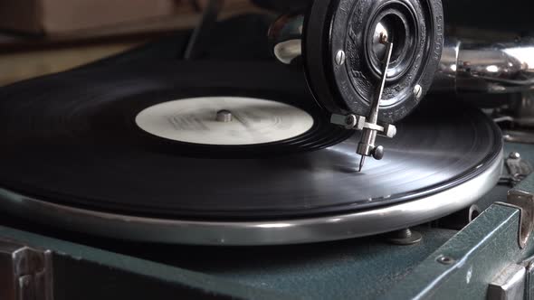 Old Phonograph Gramophone Patephone Retro Interior with Rotating Vinyl Record LP