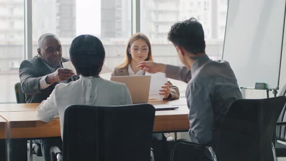 Multiethnic Business Team Businesspeople Multiracial Colleagues Managers Workers Sitting in Office