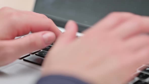 Close Up of Female Fingers Typing on Laptop