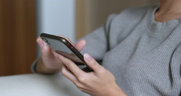 Woman check on mobile phone 