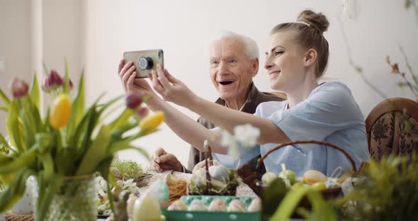 Senior Man and Woman Taking Selfie Photo at Easter Holidays.