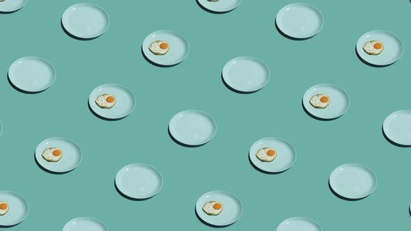 Pattern with Many Fried Eggs and Many Plates on Plates Animated