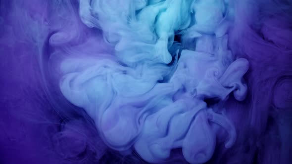 Vivid Colorful Purple Blue Pink of Acrylic Paint Drop Cloud Motion Texture Background
