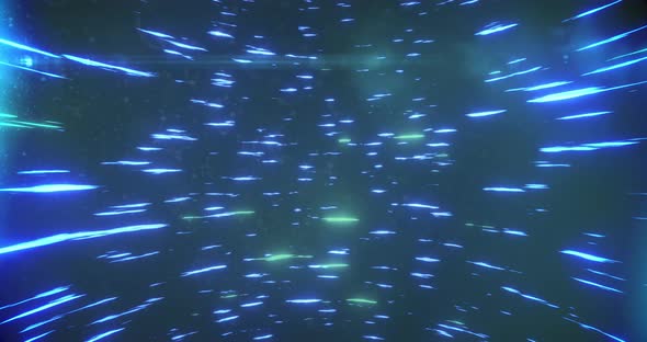 Blue and green light trails spinning against black background alt