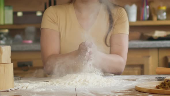 Close Up Female Hands Prepares for Kneading Dough on Table Powdering with Flour