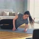 Woman Does Supine Side Leg Raises at Online Training - VideoHive Item for Sale