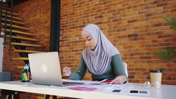 Muslim Girl Designer Has a Video Call From Her Office