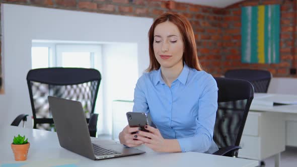 Redhead Caucasian Employee Use Mobile