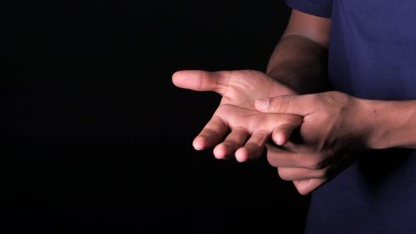 Man Suffering Pain in Hand Close Up 