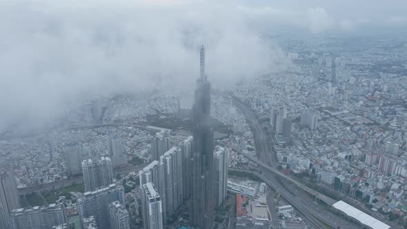 Aerial View Vinhomes Park Central Landmark81 Surrounded by Clouds in Ho Chi Minh City