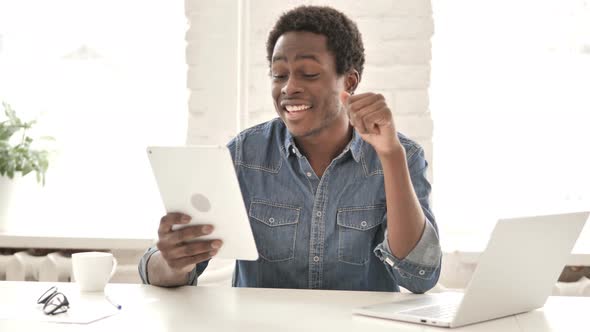 Online Video Chat on Tablet By African Man