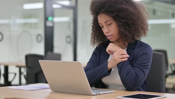 Young African Businesswoman with Laptop Having Wrist Pain 