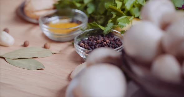 Fresh Food Ingredients On Wooden Table In Kitchen